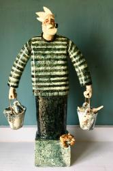 Hybrid Gallery Joe Lawrence With a Stripey Jumper and Buckets of Fish